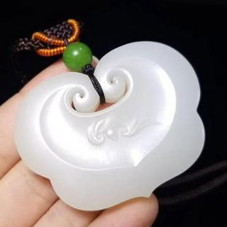 和田玉用刀刮出粉末是真玉吗