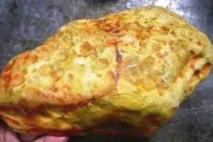 鸡油黄翡翠原石价格高吗？鸡油黄翡翠原石怎样